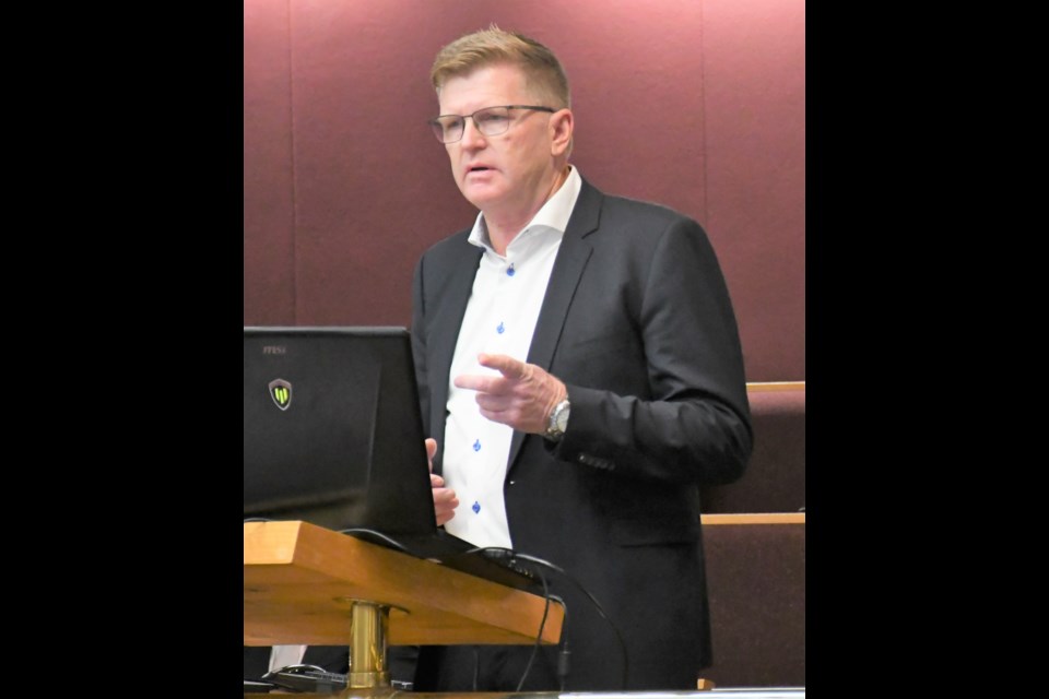 Businessman Charles Vanden Broek speaks briefly to city council on Sept. 21. He wants to build an upscale residential subdivision in the valley. Photo by Jason G. Antonio 