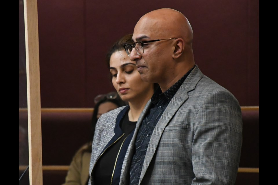 JC Chhokar and his wife speak to city council about the proposed development project. Photo by Jason G. Antonio