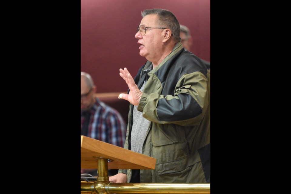 Preston Folbar speaks to city council about the property maintenance cleanup orders he received, during a recent executive committee meeting. Photo by Jason G. Antonio