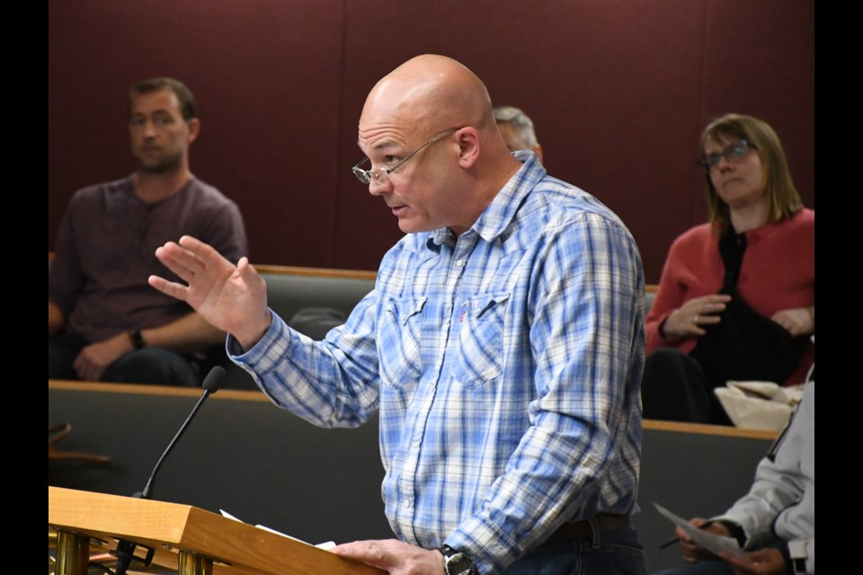 Homeowner John Vincent speaks to city council about proposing zoning bylaw changes. Photo by Jason G. Antonio