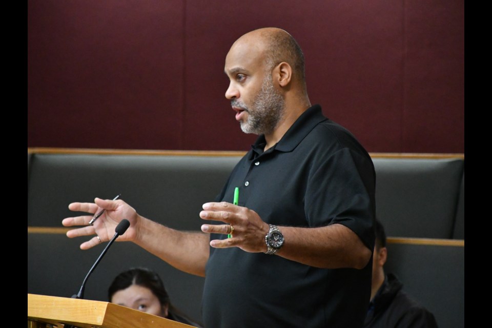 Homeowner Fabrice Dourlent speaks to city council about the proposed stormwater utility bylaw. Photo by Jason G. Antonio