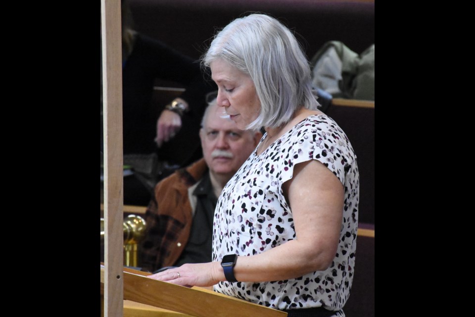 Dana Haukaas, executive director with the Humane Society, speaks to city council. Photo by Jason G. Antonio