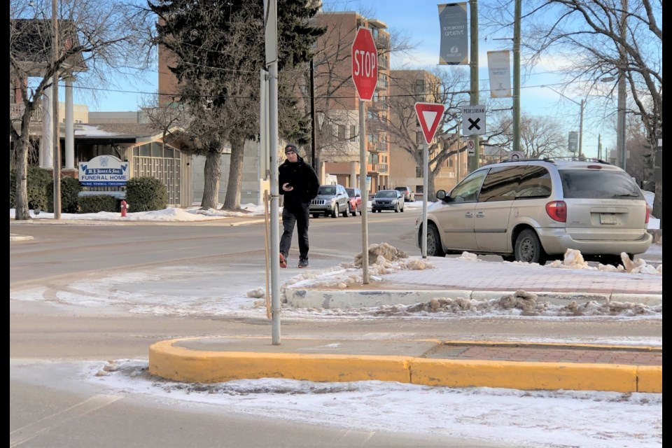 Signage and infrastructure upgrades are coming this year to the intersection of Athabasca Street East and Langdon Crescent for better pedestrian safety. Photo by Jason G. Antonio 
