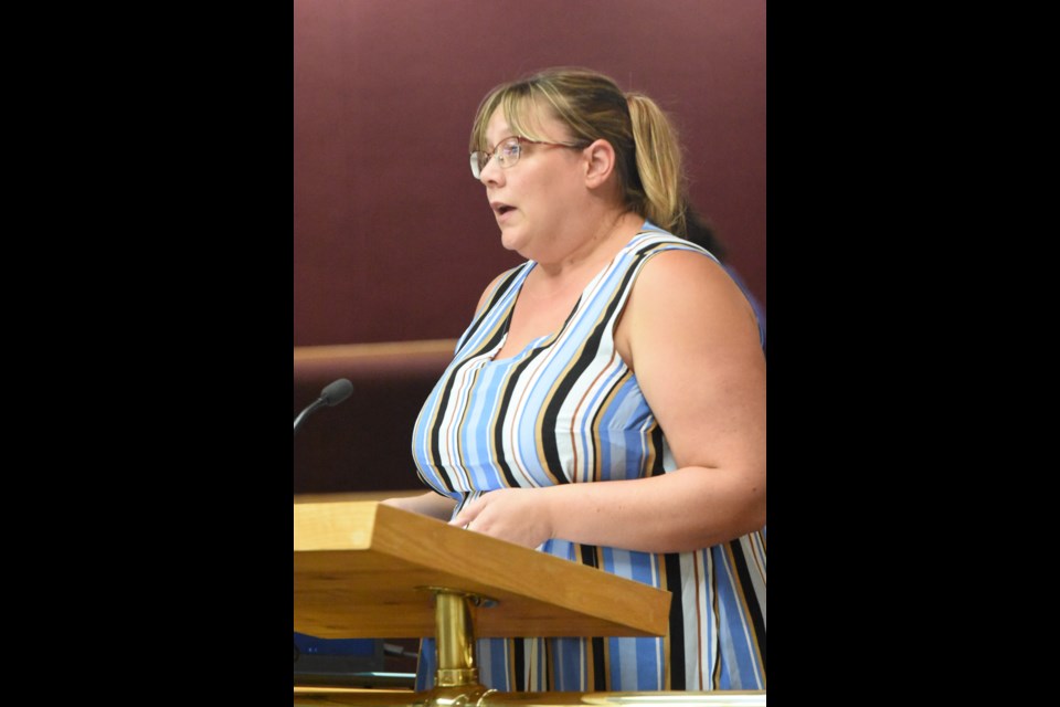 Crystal Milburn, secretary/treasurer with the Downtown Moose Jaw Association, speaks to council about the group's goals, during the Aug. 12 regular council meeting. Photo by Jason G. Antonio