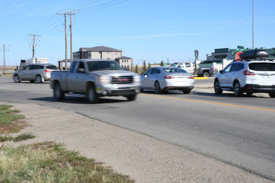 The intersection of Ninth Avenue Northeast and Thatcher Drive is a busy one most days. Photo by Jason G. Antonio 
