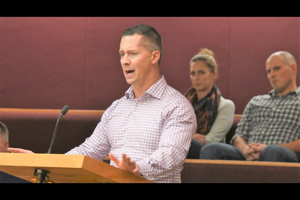 Chris Olfords, with the West Park Community Association, speaks to city council about the group's proposed playground project, on Oct. 15. Photo by Jason G. Antonio 