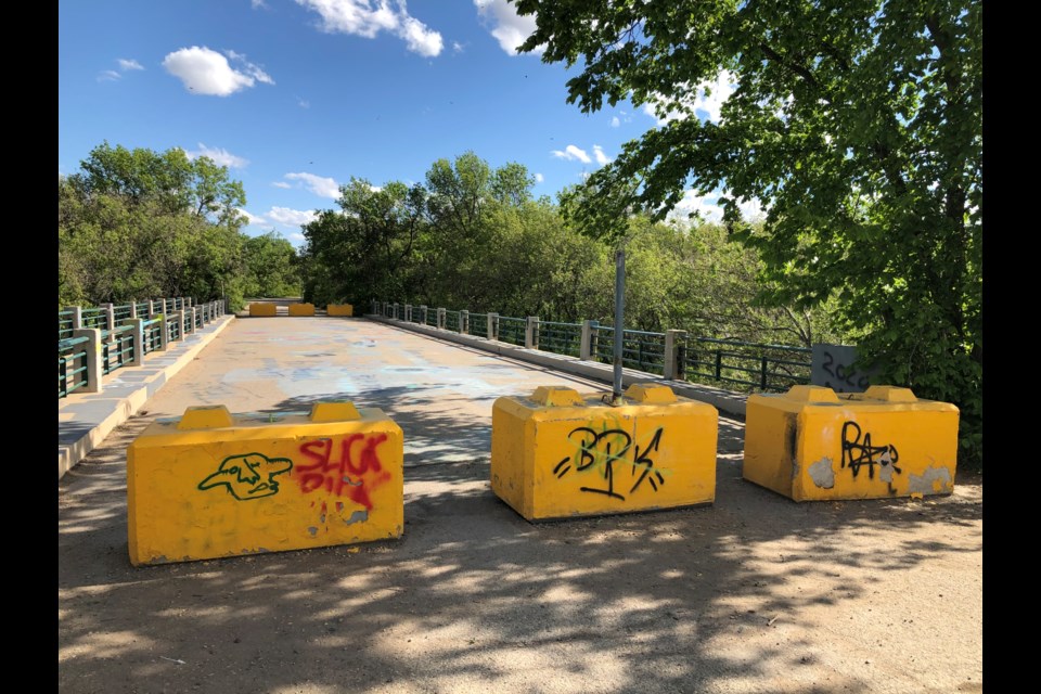 The City of Moose Jaw closed the Seventh Avenue Southwest Bridge in 2015 after floods damaged the structure. Two families who use this bridge to access their properties have been forced to go through the Valley View Centre property since then. Photo by Jason G. Antonio  