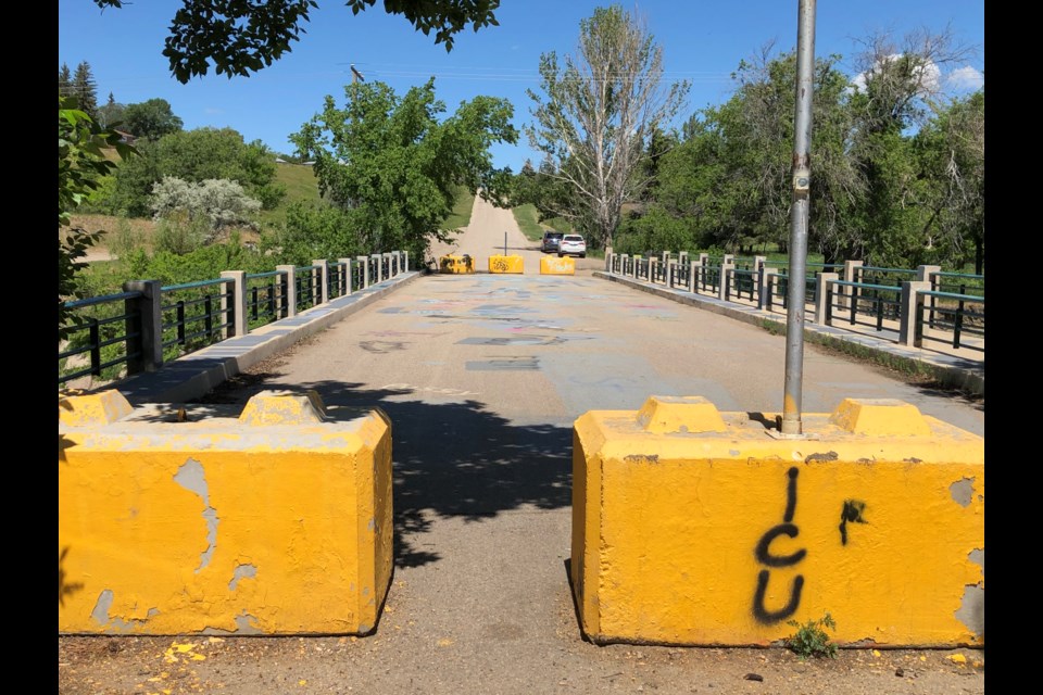 A view of the Seventh Avenue Southwest Bridge looking north over the bridge and up the street. Photo by Jason G. Antonio 