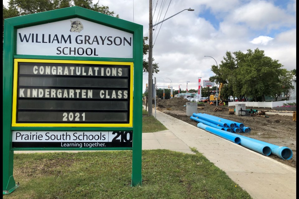 The drop-off and pick-up of students at William Grayson School won't happen on Caribou Street West until at least October, as construction work is happening in front of the school. Photo by Jason G. Antonio 