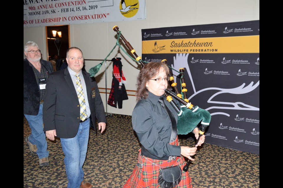 Lisa McCormick pipes in the Saskatchewan Wildlife Federation's board of directors during the opening ceremonies of the 90th annual SWF convention. (Matthew Gourlie photograph)