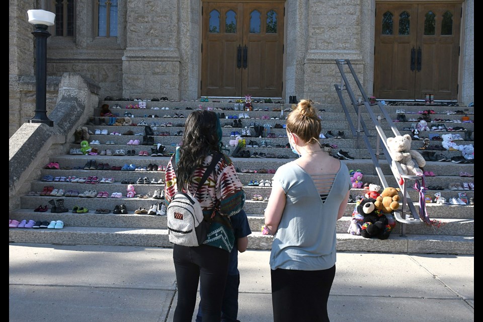 People of all ages gathered at the memorial for the 215 victims of the Kamloops residential school located at St. Andrew’s United Church.