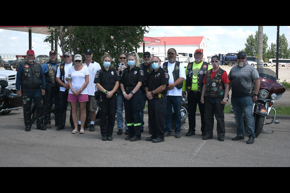Moose Jaw and District EMS join members of the Bikers for Bears and Teddy Bears Anonymous for a group photo in the A&W North Service Road parking lot.