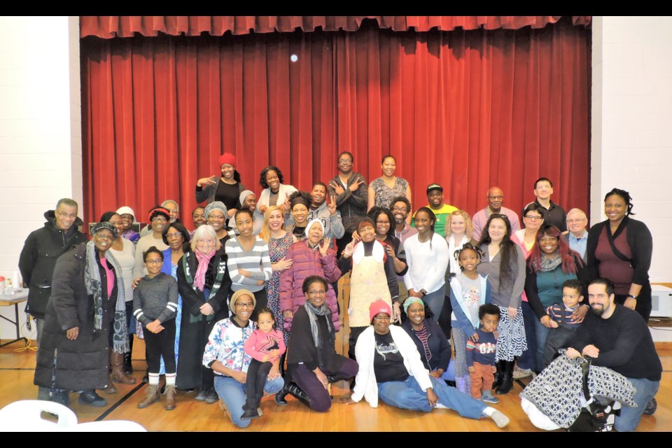 Some of the Black History Month Breakfast attendees joined in for a picture to celebrate the occasion. (Sasha-Gay Lobban photo)