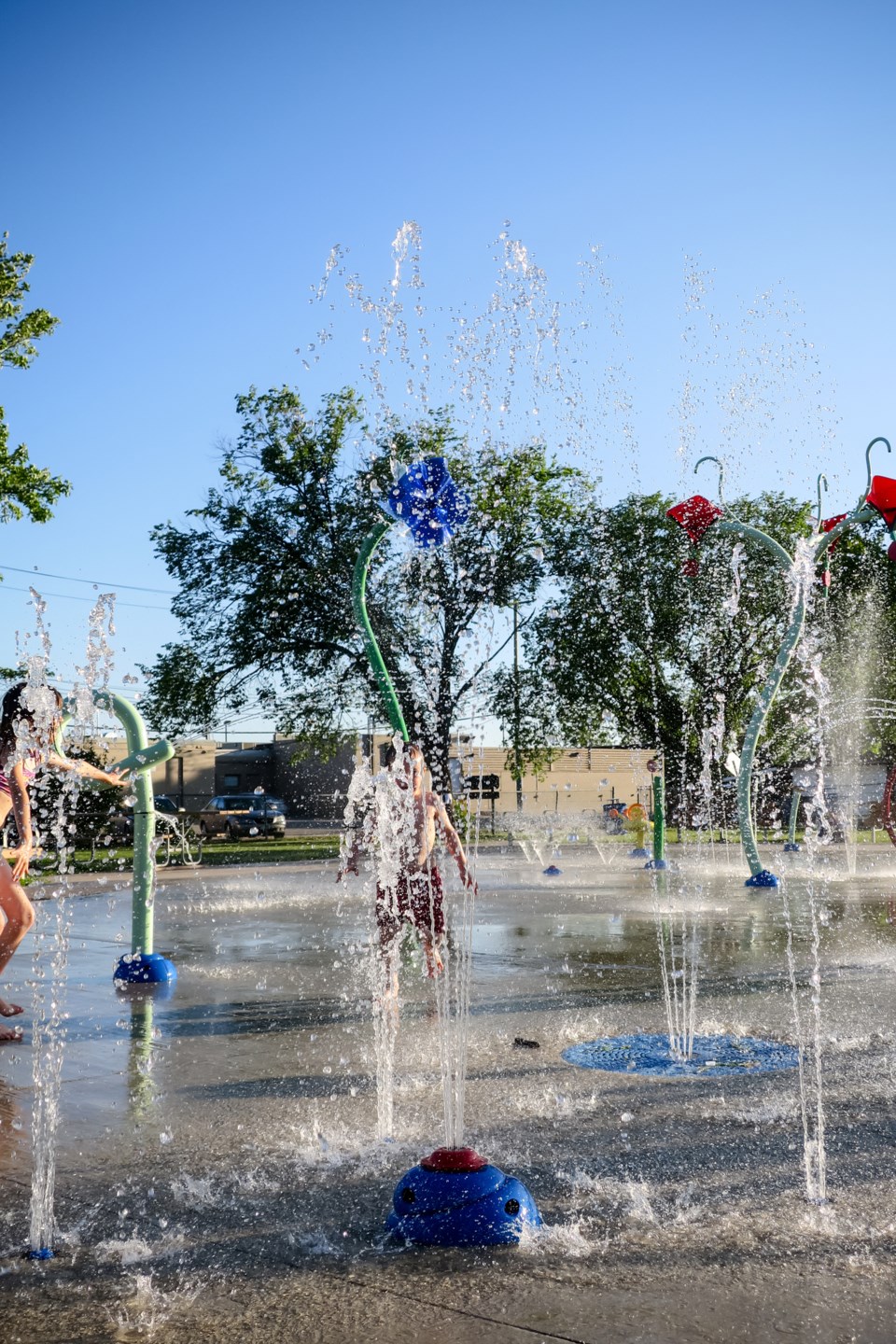 children-frolic-in-the-neighbourhood-spray-park-ahphotoswpg-istock-getty-images-plus