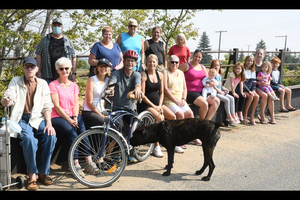 A group of South Hill residents gathers on the Coteau Street East bridge to protest the proposed demolition of the structure. Photo by Jason G. Antonio 