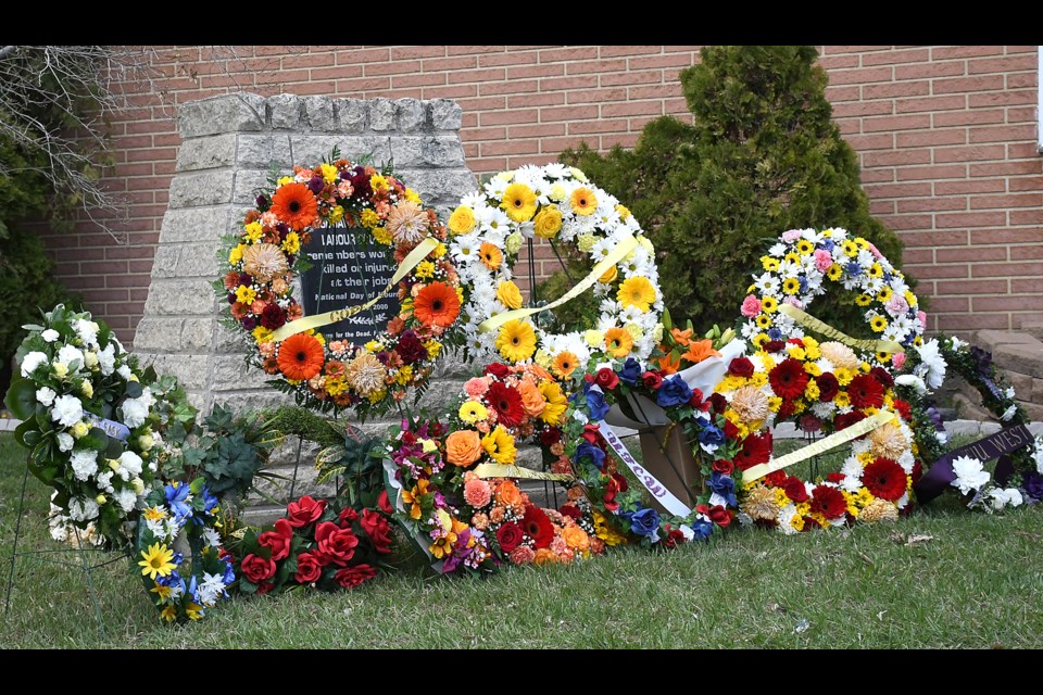 Supporter from various local unions and organizations laid wreaths at the cairn outside the Moose Jaw and District Labour Council building.