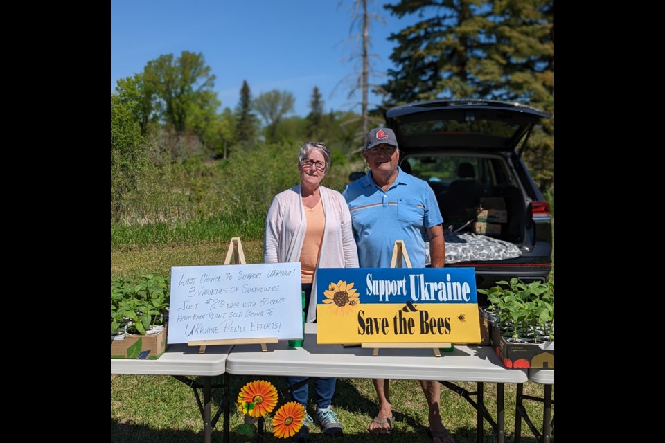 Bernadette and Leonard Mintenko raised $1,035 for Ukraine by selling sunflowers at the Wakamow Farmer's Market