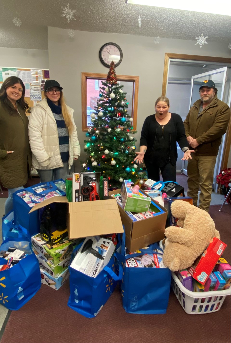 jami-lee-cuthbert-emily-bishop-and-brad-butcher-at-the-salvation-army-depot