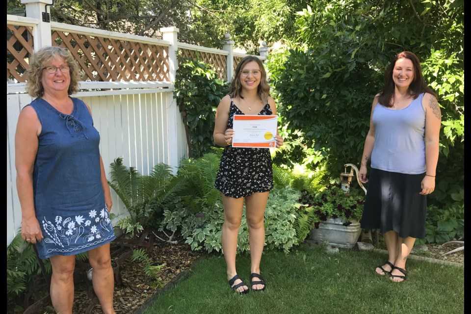 Madison Thul presented with her STAR award by PEO members Donna Forbes and Julie Henrickson. (Supplied)