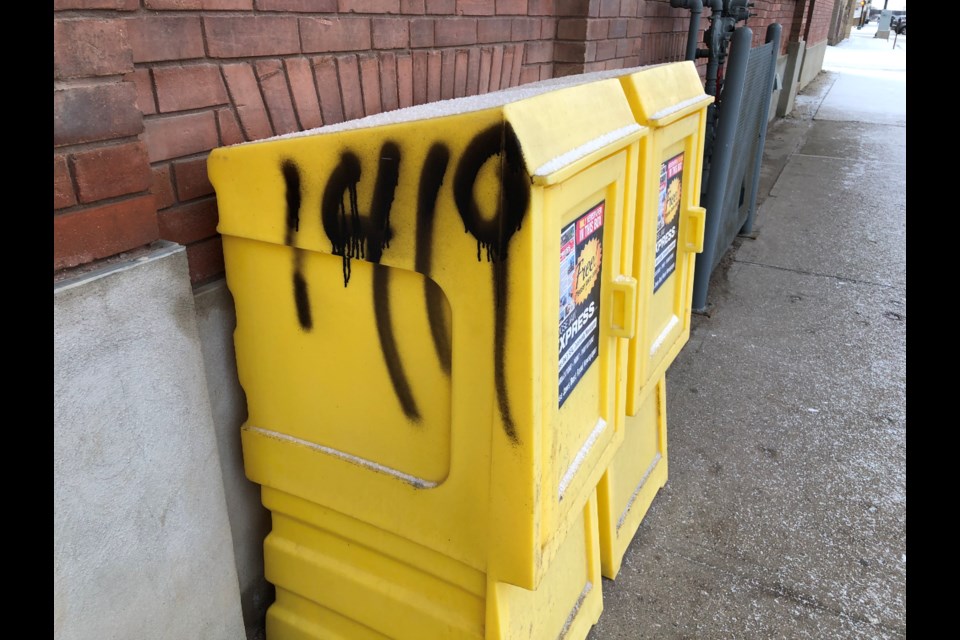 A newspaper box outside the office of the Moose Jaw Express/MooseJawToday.com was tagged with graffiti. Photo by Jason G. Antonio 