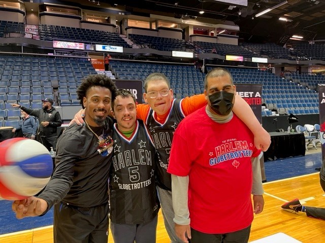 Globetrotter "Too Tall" Winston with Calvin Schaaf, Devin Magnuson, and Jason Nanan