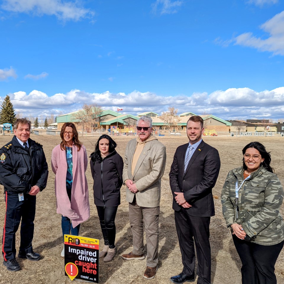 group photo for impaired driver sign campaign kickoff