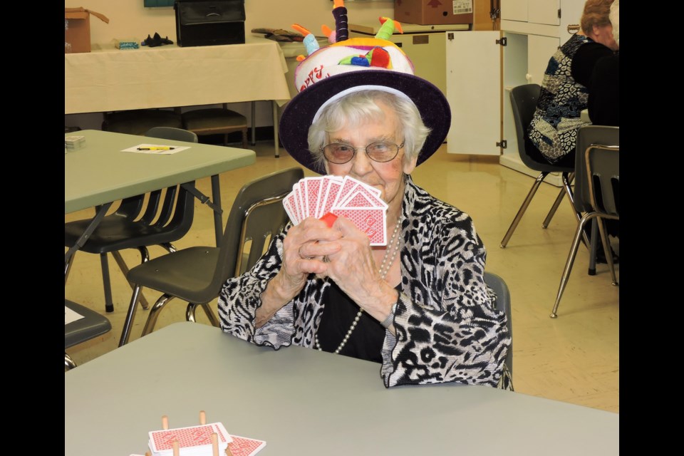 Beler enjoys a card game. (Sasha-Gay Lobban)