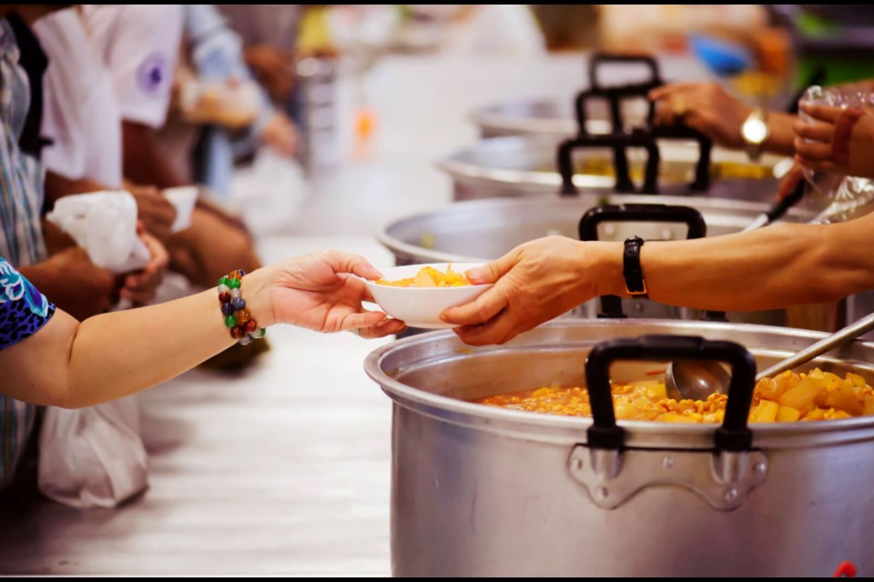 Hope Ministries serving food. Photo from Facebook