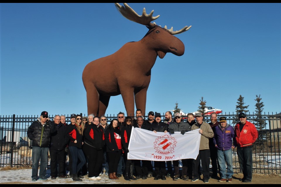 The Moose Jaw Kinsmen, Moose Jaw Kinnettes, and K40 members gathered to raise the Kin Canada flag on the centennial Founder’s Day on Feb. 20.