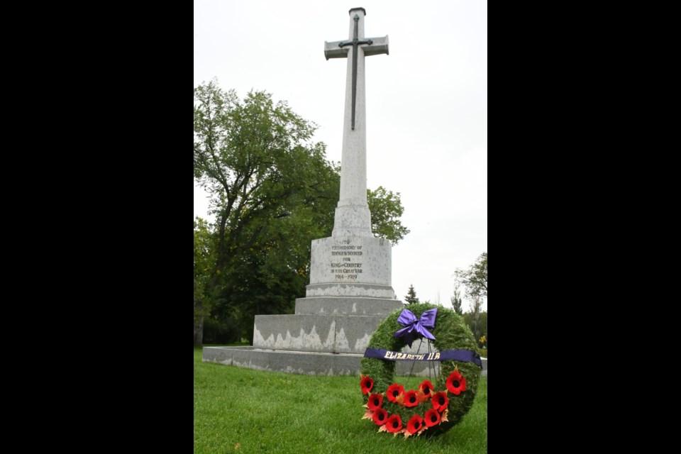 The memorial cross before the service. Photo by Jason G. Antonio