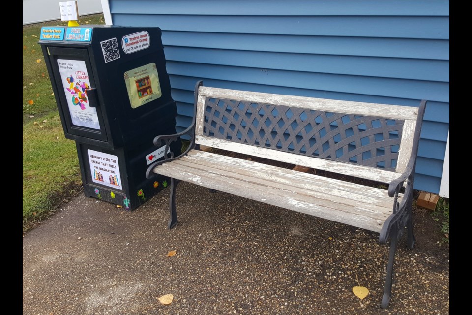 The Little Library established by Teresa and Del Mar Davies at B12 Prairie Oasis Trailer Court.