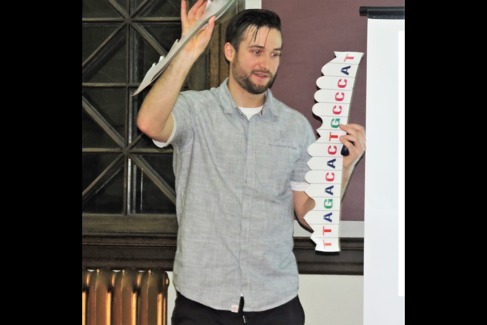 Educator, Logan Petlak makes an engaging presentation about DNA. (Sasha-Gay Lobban photograph)