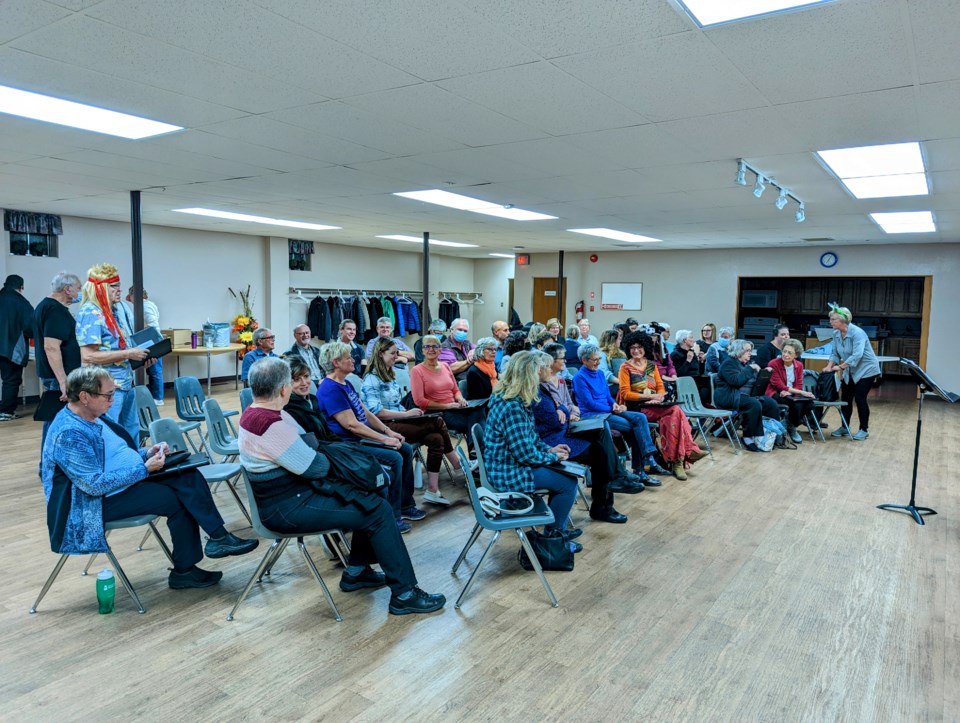 the-moose-jaw-community-choir-warms-up-for-a-halloween-evening-practice