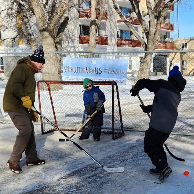 Mayor Tolley (tallest, on the left) plays 3 on 3 with some other local players