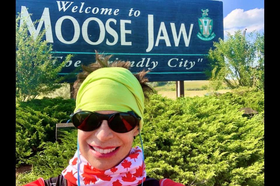 Runner Helene Neville poses for a picture after reaching the City of Moose Jaw on her run across Western Canada to honour Terry Fox. Photo courtesy Facebook