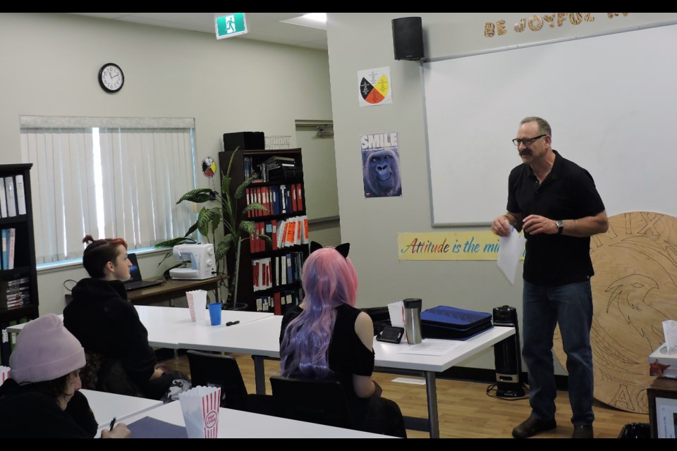 Local geoscientist engineer Nolan Shaheen talks to students at Phoenix Academy for Engineering and Geoscience Week. (Sasha-Gay Lobban)     