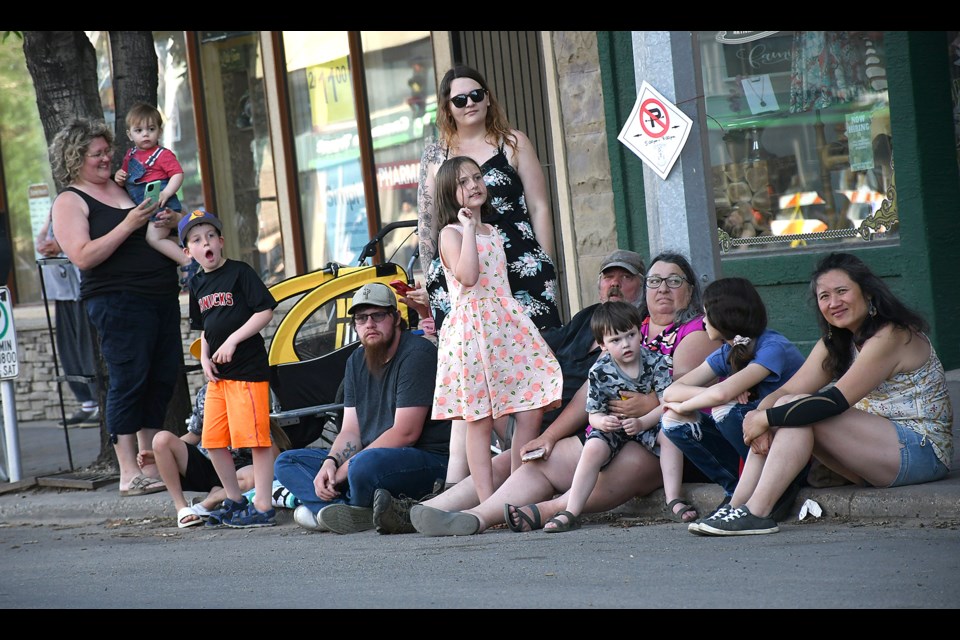 Parade onlookers wait in anticipation for the start of the Hometown Fair Parade.