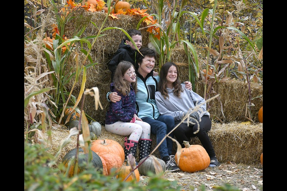 A pair of photo areas were set up for autumn-themed pictures, including pumpkins grown in the gardens only a few feet away.