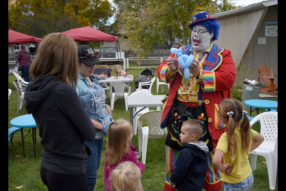 Derf the Clown was on hand at the Harvest Festival, whipping up balloon animals of all sorts for youngsters.