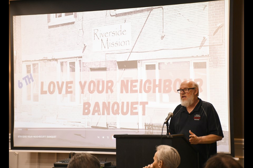 Souls Harbour executive director Joe Miller answers questions from the crowd to conclude the event on Wednesday night.