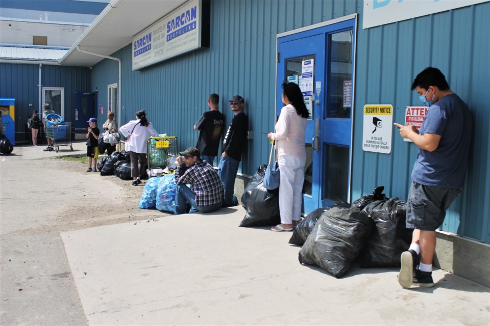 Residents stand in line outside the SARCAN recycling depot in Moose Jaw waiting to take in their bottles and containers. File photo 