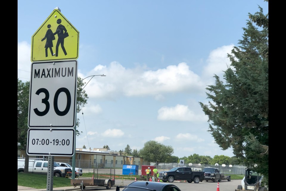 City crews have started installing new 30 km/h speed signs in school zones, with this sign near Lindale School. Photo by Jason G. Antonio