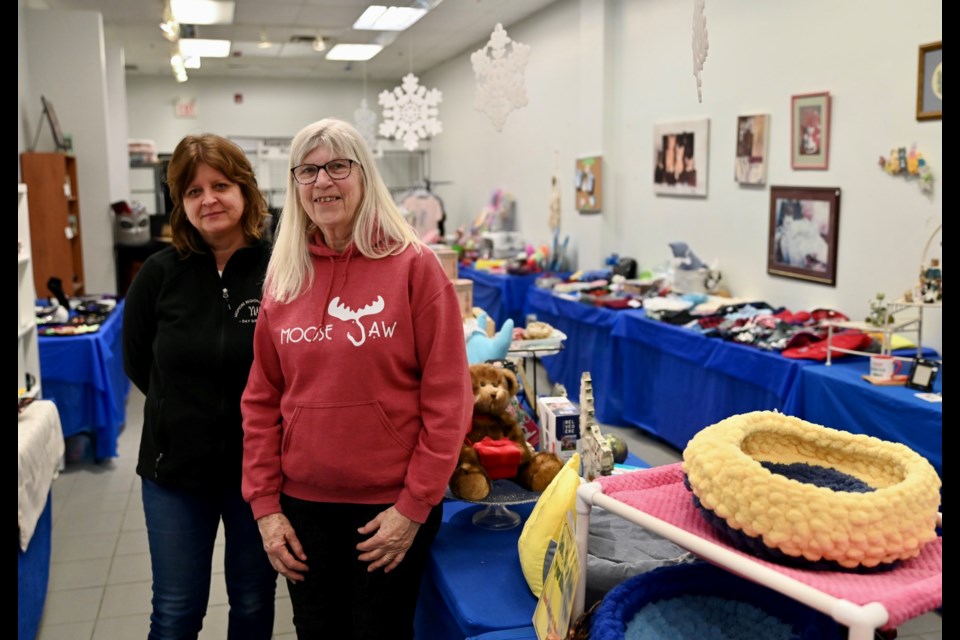 Anne Marcyshyn (left) and Susan Neal, Store Coordinator, inside the new store