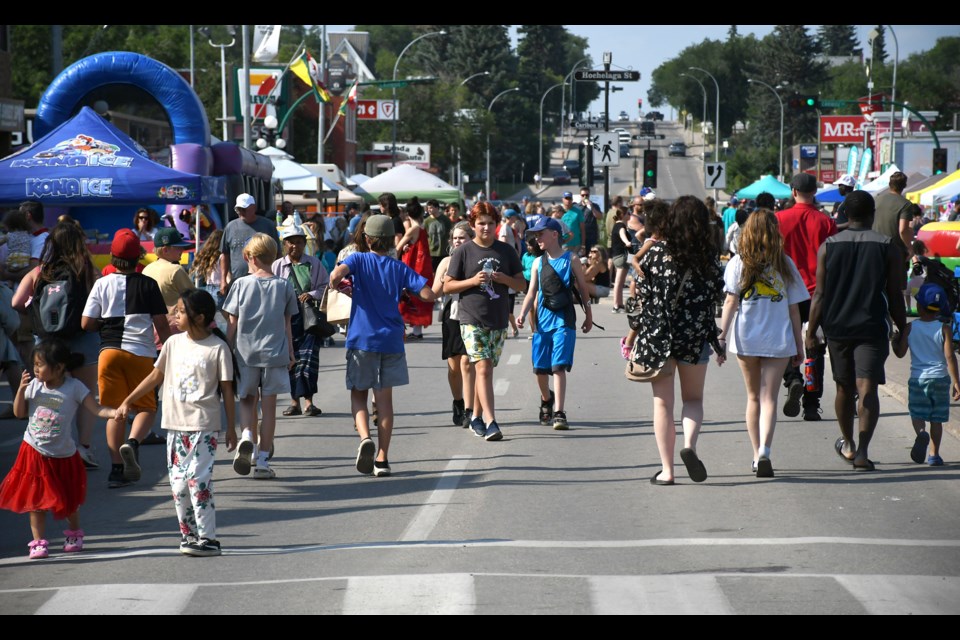 Folks check out some of the sights during Sidewalk Days on Thursday afternoon.