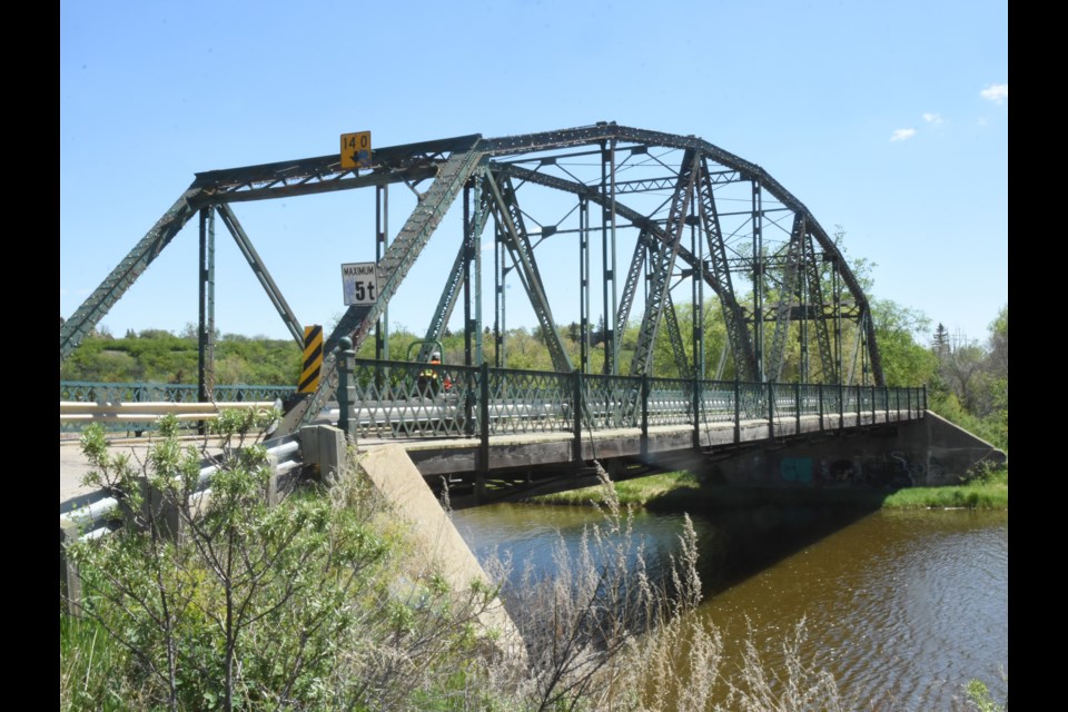 The Sioux bridge leading to the Lorne Calvert Campground in Wakamow Valley. Photo by Jason G. Antonio