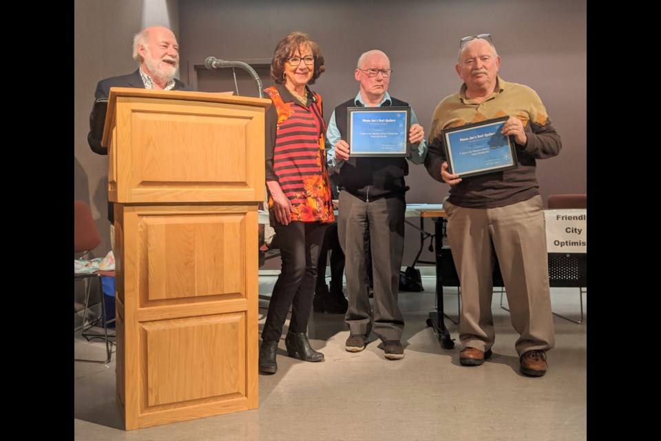 Rob and Greg’g from the Friendly City Optimists receive their certificates after winning the third annual Rotary Club of Moose Jaw Wakamow’s Spelling Bee and Beeyond, on Jan. 30 at the art museum theatre. Photo by Graham Lynds