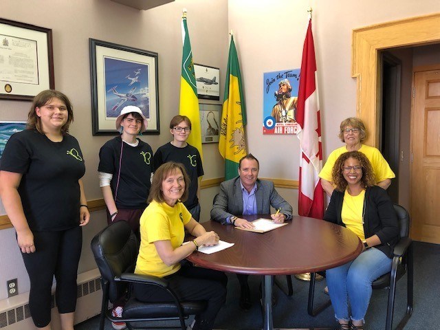 Members of both chapters of Journey to Hope with Mayor Fraser Tolmie as he declares Sept. 10 World Suicide Prevention Day in Moose Jaw. (supplied)