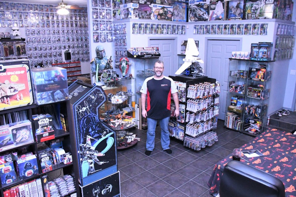 Ryan Johnson has collected more than 50,000 Star Wars items since 1978, with about 20 per cent on display in his man cave. All photos by Jason G. Antonio 