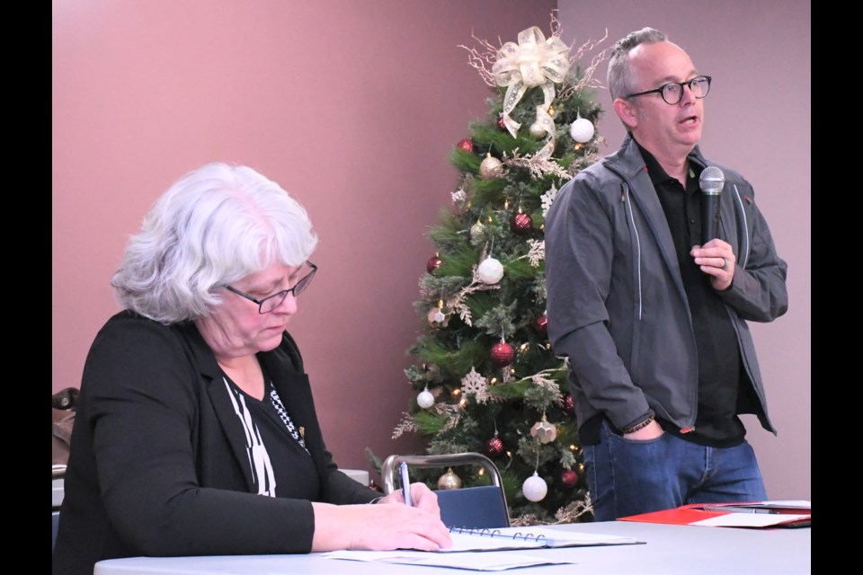 NDP MLA Cathy Sproule takes notes while Todd Johnson, general manager of Wakamow Valley Authority, speaks about the meetings his organization has had with the provincial government about land on the Valley View Centre property. Photo by Jason G. Antonio