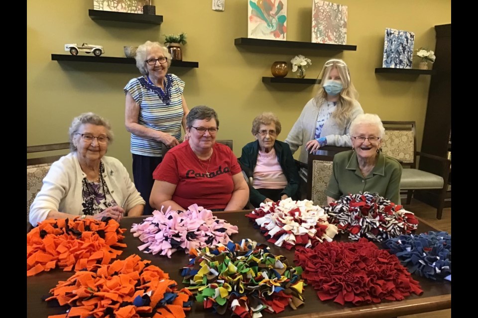 West Park Crossing retirement home's 'Snuffle Mat Gang' with some of their creations